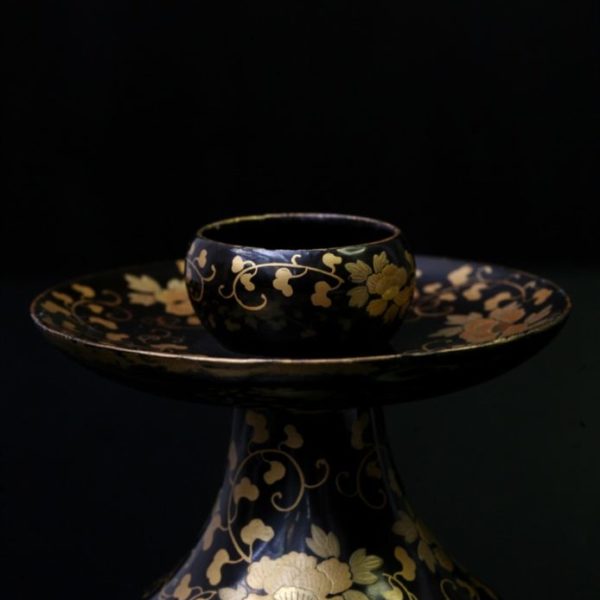 Japanese candle holder decorated with chrysanthemums